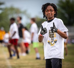 Hoover Hosts TnT Football Camp: Four hundred young football players were at Hoover High School on a late June Saturday to hone their skills and learn new ones. Hoover was the site of the TnT All-Star Football Camp, organized by Iowa Hawkeye greats Tim Dwight and Tavian