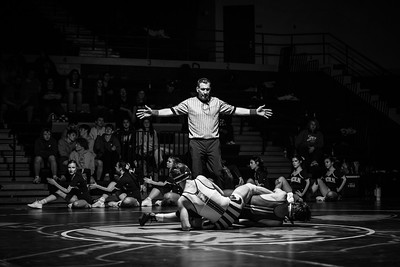 Wrestling in Black and White: Wrestling meets at the Lincoln Roundhouse are known for the action on the mat and the dramatic lighting: a single illuminated globe suspended over the grapplers. At a triangular meet Lincoln hosted with Ottumwa and Roosevelt, we tried to match the dramatic mood with our black-and-white photos of the competition.